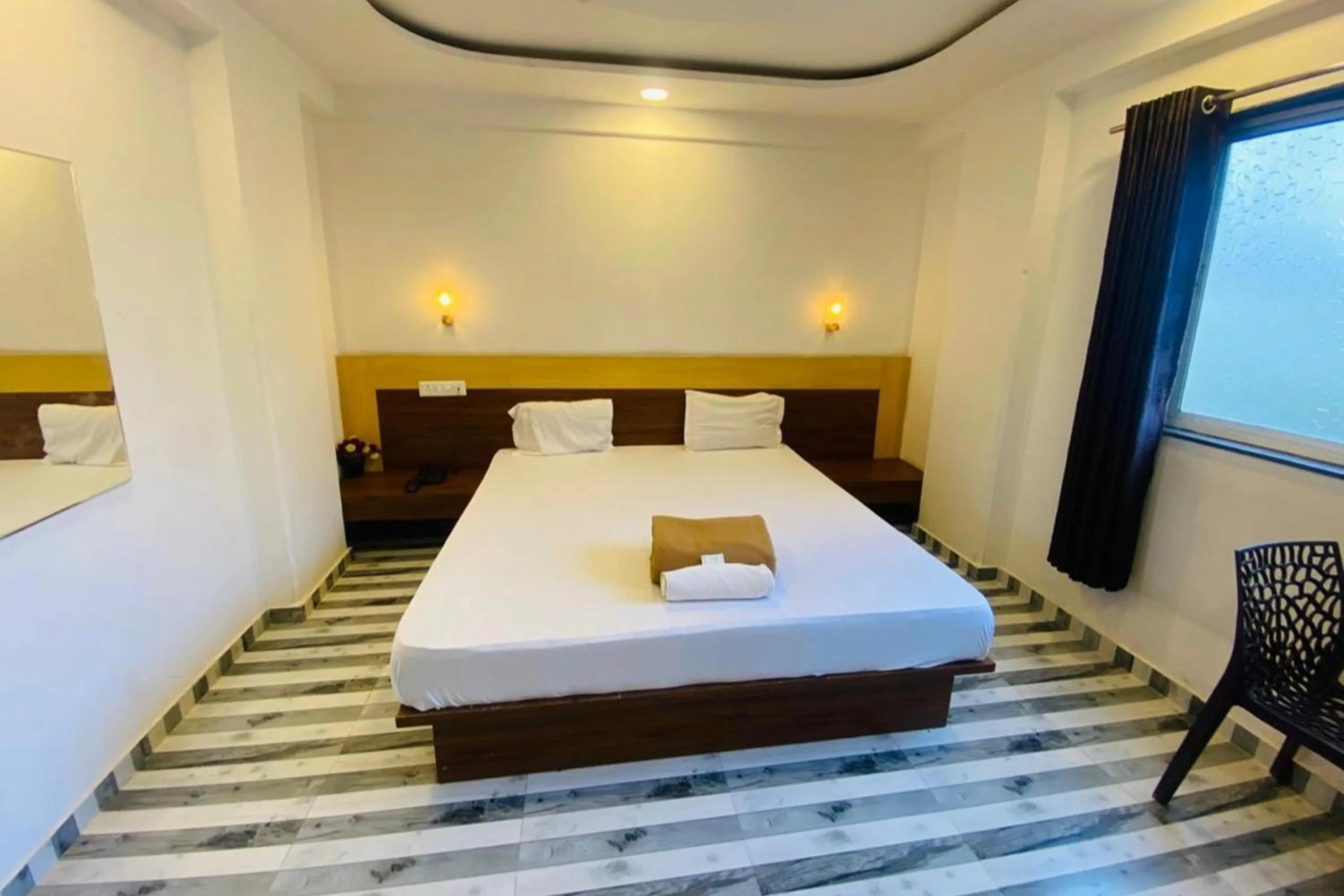 Bed in Sai Vishwa Lodging