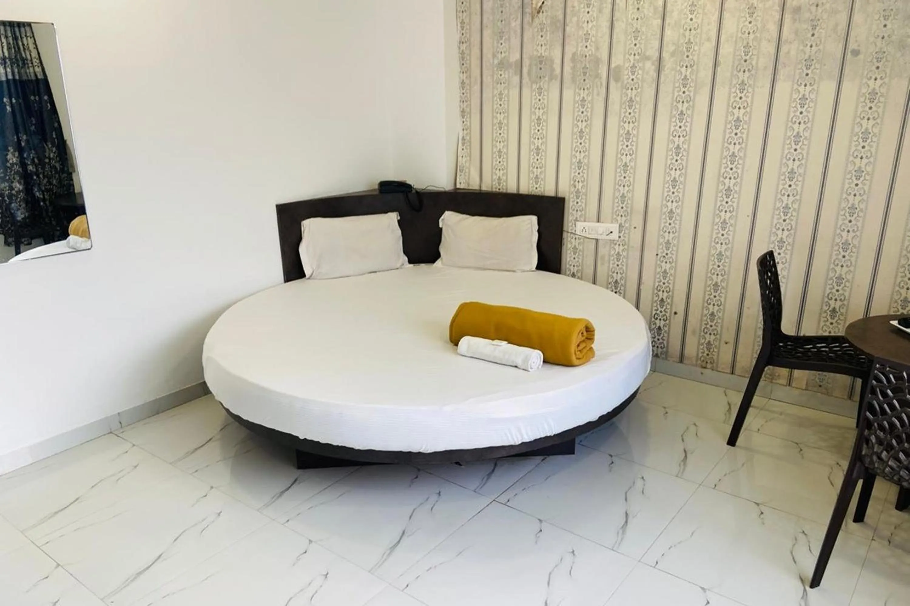 Bed in Sai Vishwa Lodging