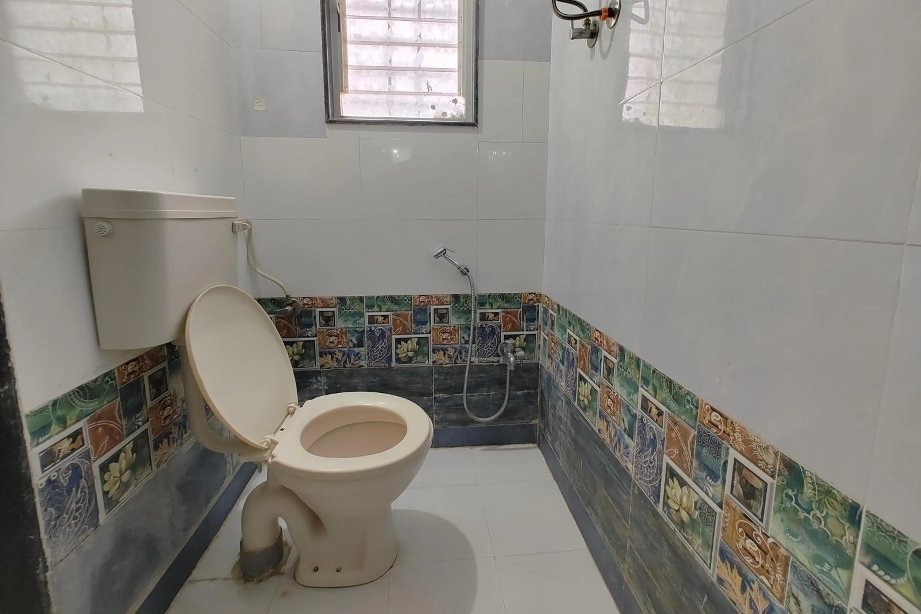 Toilet in Sai Vishwa Lodging