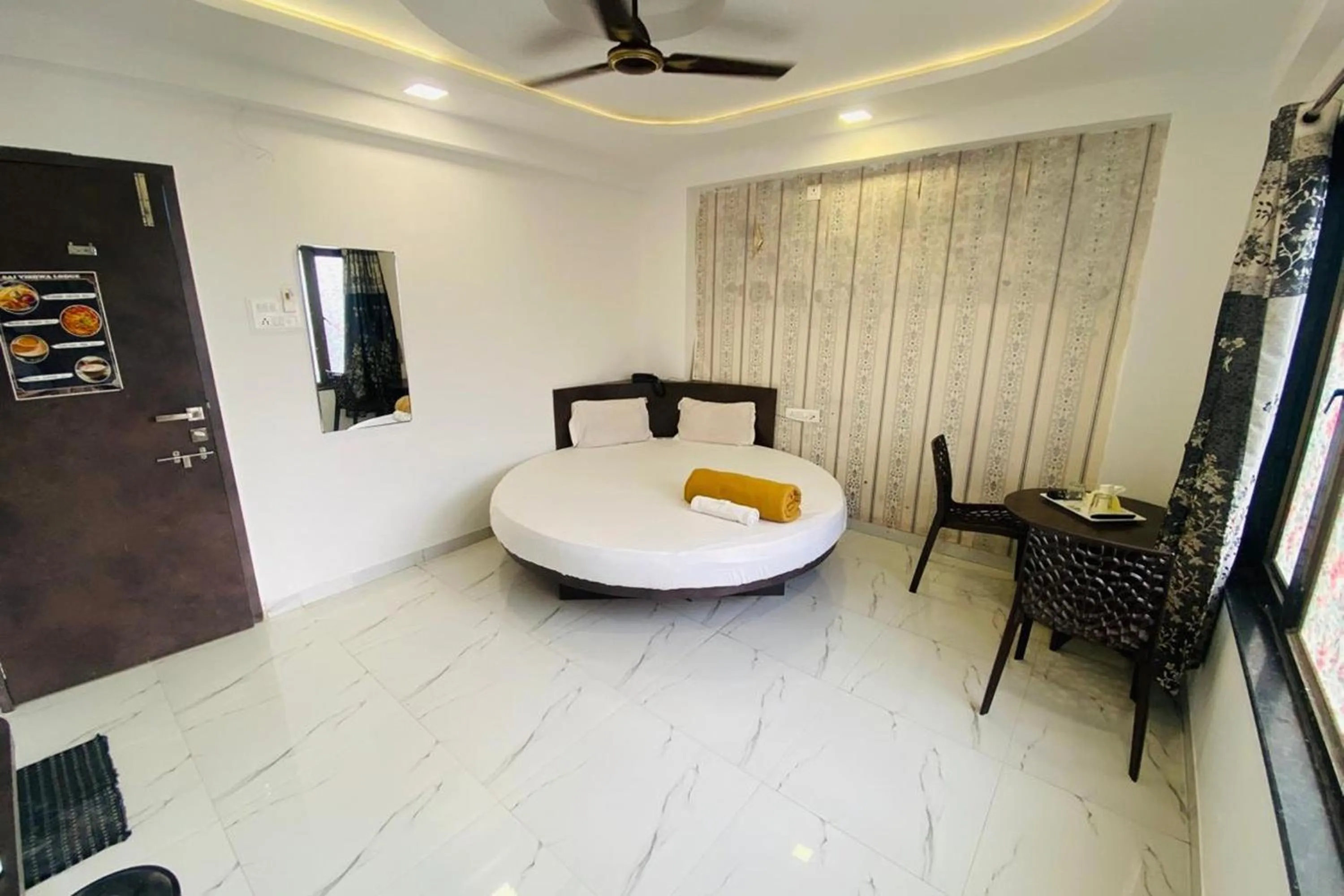 Bed in Sai Vishwa Lodging