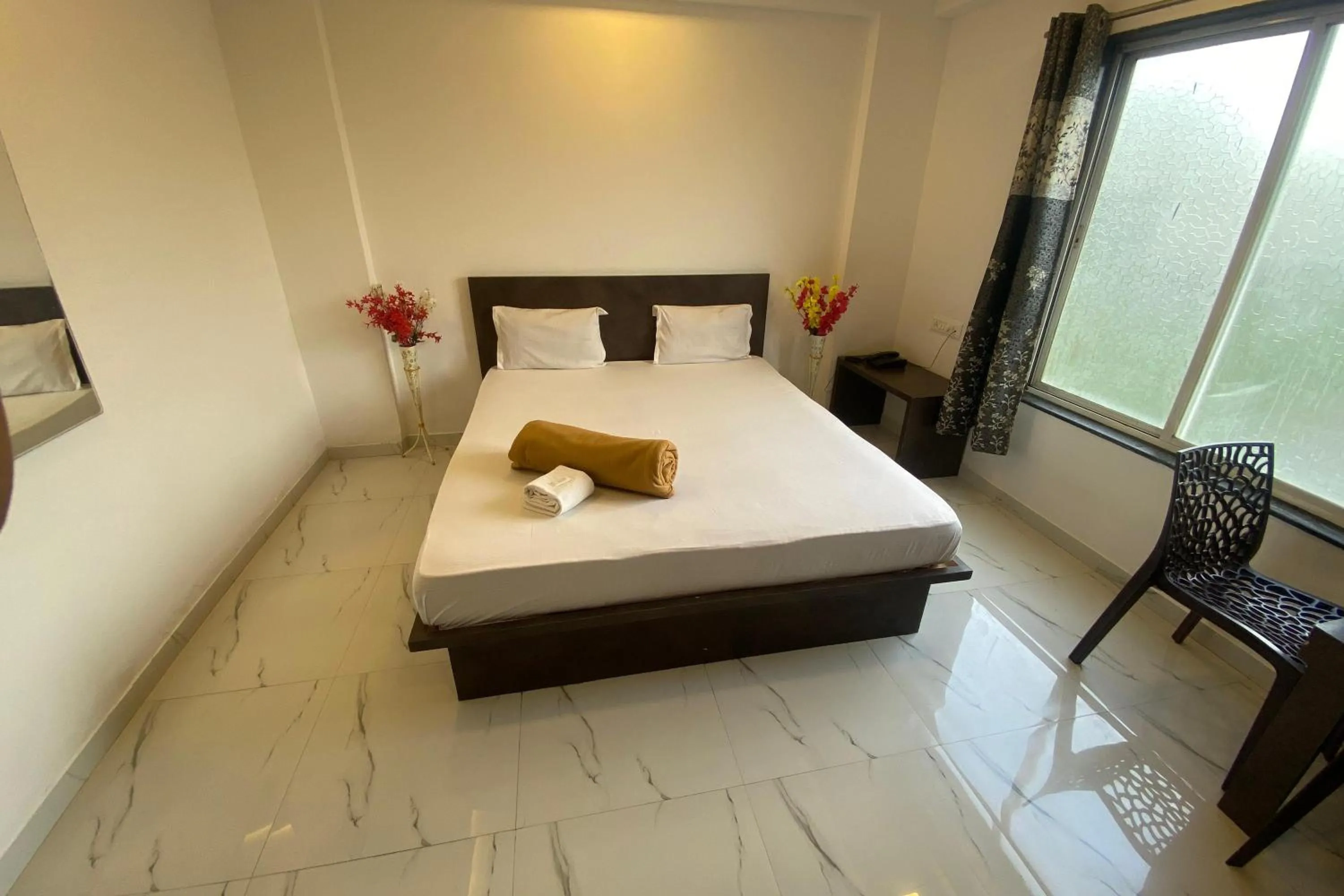 Bed in Sai Vishwa Lodging