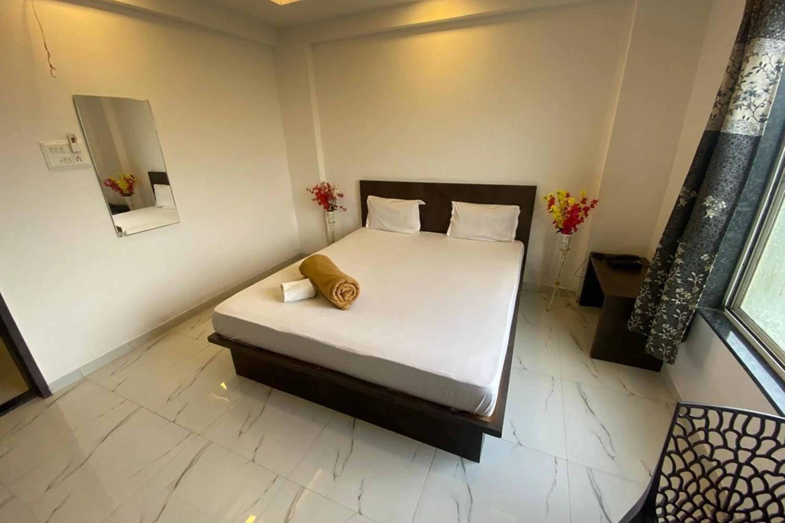 Bed in Sai Vishwa Lodging