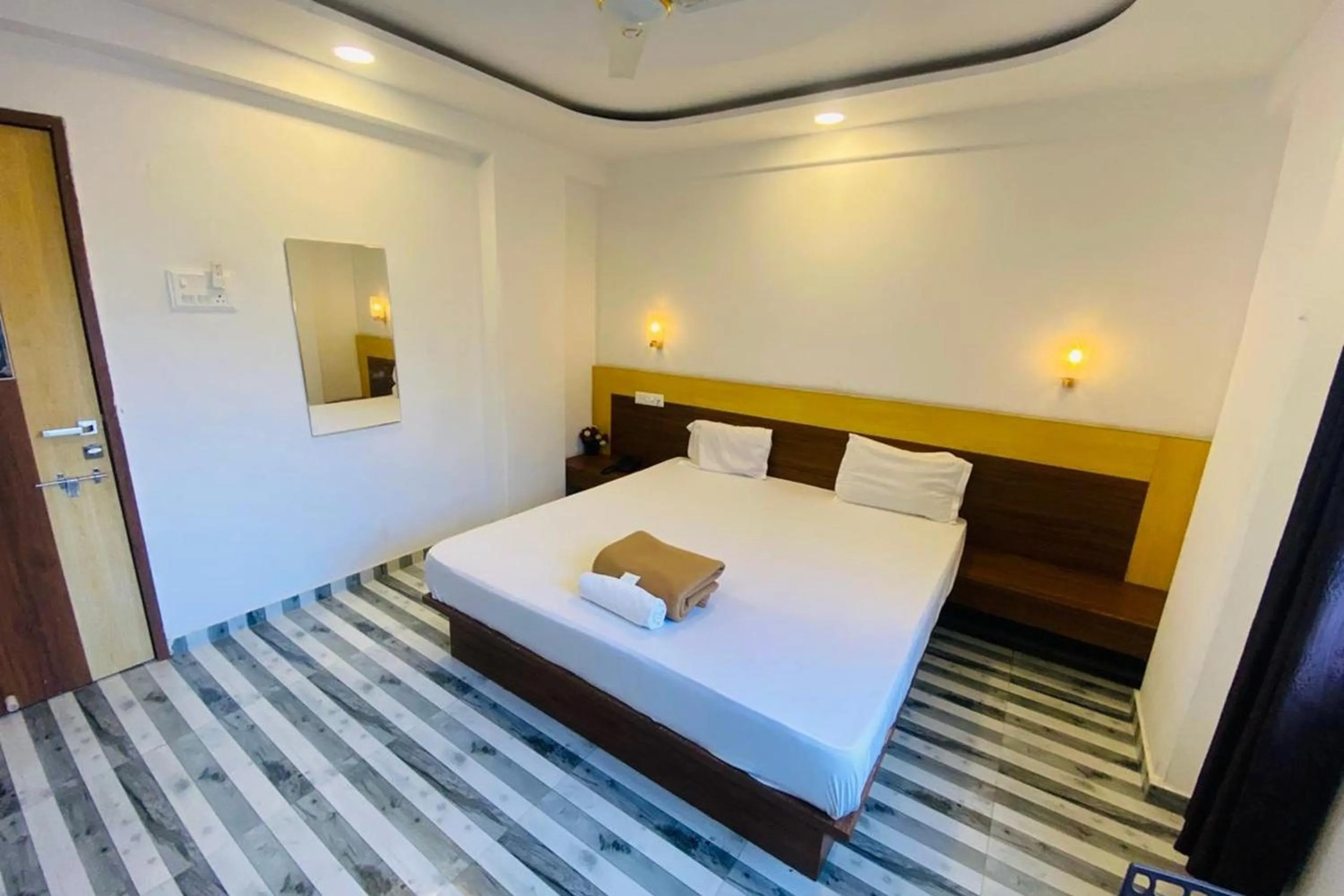 Bed in Sai Vishwa Lodging