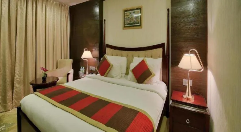 Bed in POLO Inn & Suites