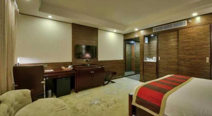 Bed in POLO Inn & Suites