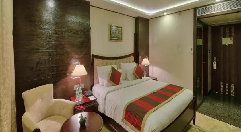 Bed in POLO Inn & Suites