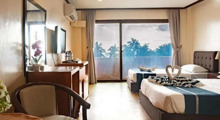 Bed in Vista Marina Hotel and Resort