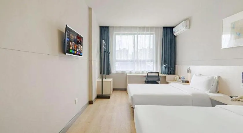 Bed in Jinjiang Inn Shanghai International Tourism and Resorts Zone Kangxin Highway Branch
