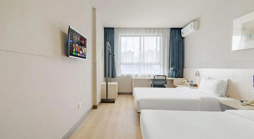 Bed in Jinjiang Inn Shanghai International Tourism and Resorts Zone Kangxin Highway Branch