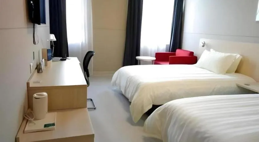 Bed in Jinjiang Inn Shanghai International Tourism and Resorts Zone Kangxin Highway Branch