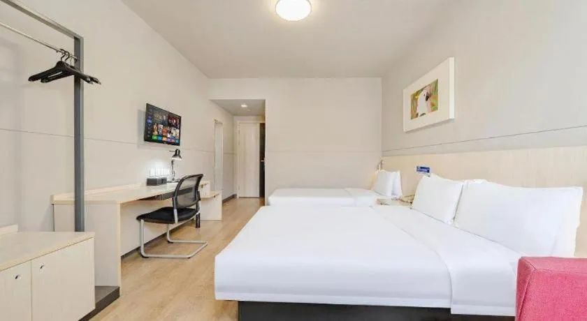 Bed in Jinjiang Inn Shanghai International Tourism and Resorts Zone Kangxin Highway Branch