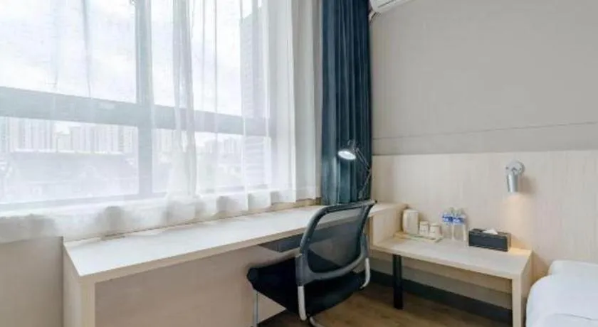 Bed in Jinjiang Inn Shanghai International Tourism and Resorts Zone Kangxin Highway Branch