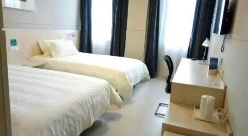 Bed in Jinjiang Inn Shanghai International Tourism and Resorts Zone Kangxin Highway Branch