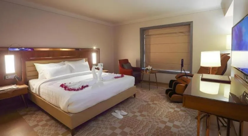 Bed in The Grandeur Boutique Hotel