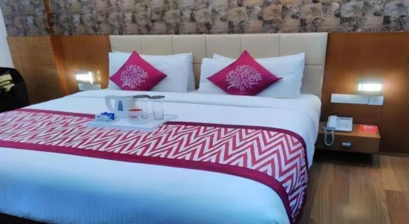 Bed in Hotel Signature Grand