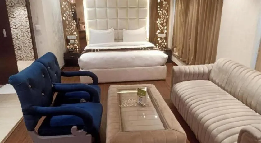 Bed in Hotel Signature Grand
