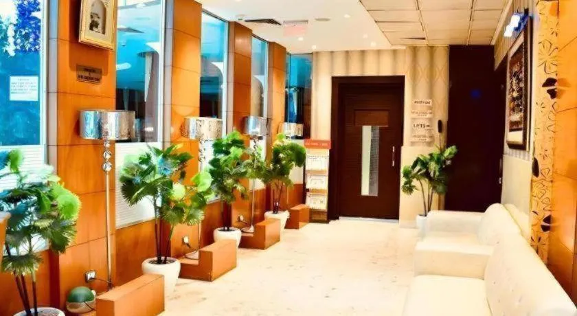 Bed in Hotel Signature Grand