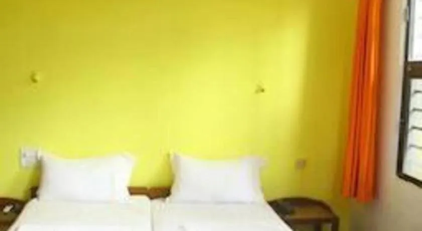 Bed in Poonam Village Resort