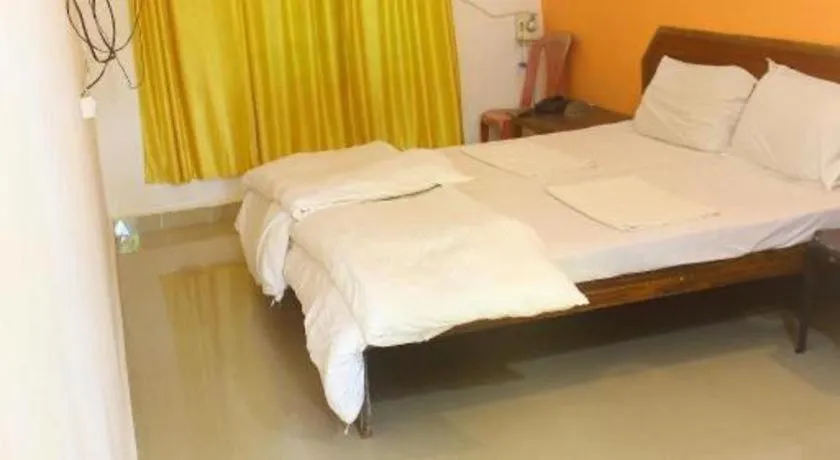 Bed in Poonam Village Resort