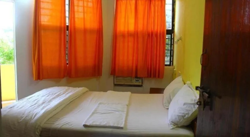 Bed in Poonam Village Resort