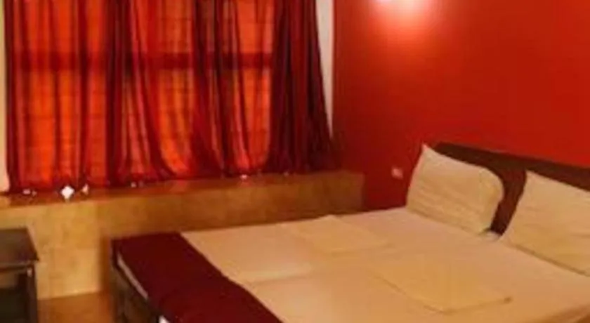 Bed in Poonam Village Resort