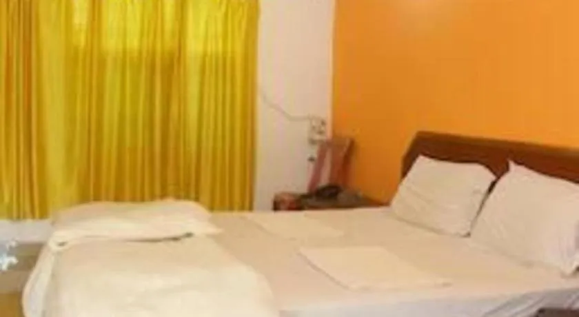 Bed in Poonam Village Resort
