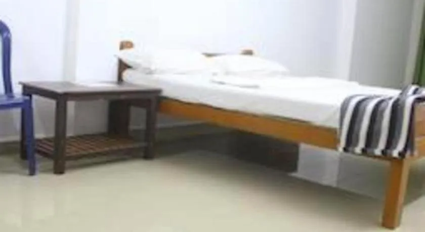 Bed in Poonam Village Resort