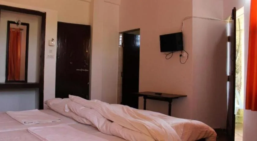 Bed in Poonam Village Resort