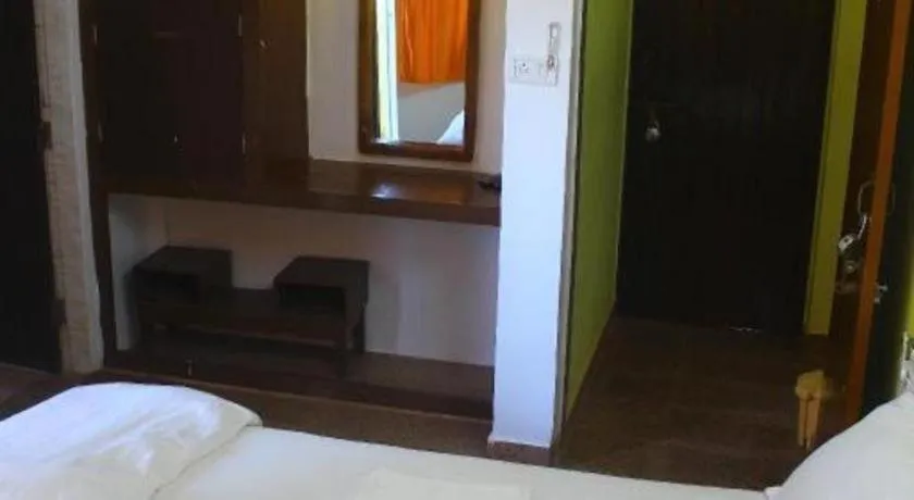 Bed in Poonam Village Resort