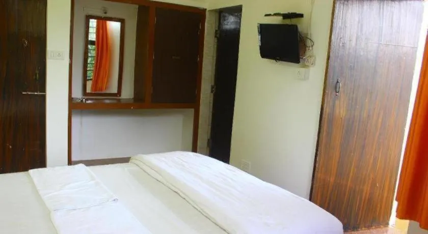 Bed in Poonam Village Resort