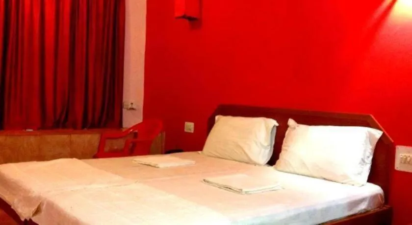 Bed in Poonam Village Resort