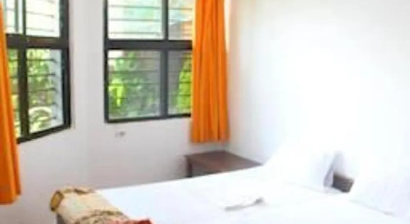 Bed in Poonam Village Resort