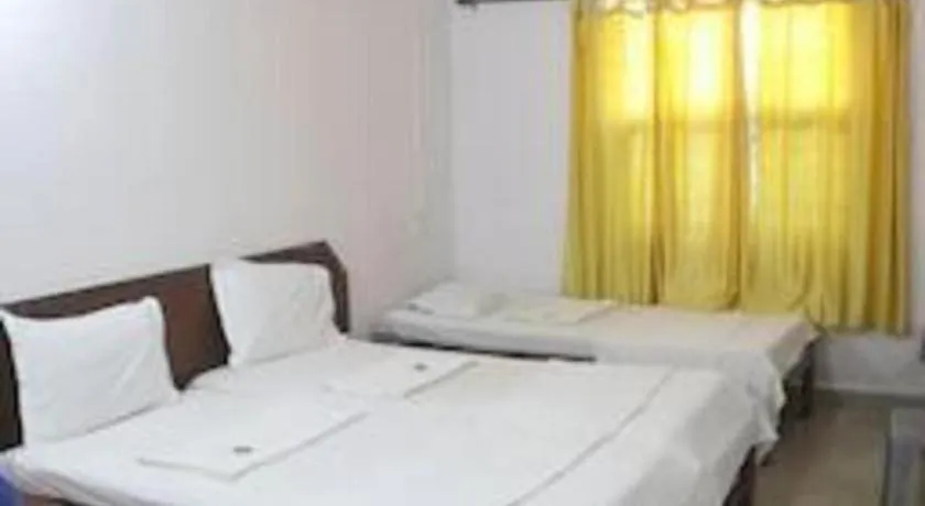 Bed in Poonam Village Resort
