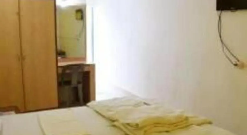 Bed in Poonam Village Resort