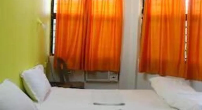 Bed in Poonam Village Resort