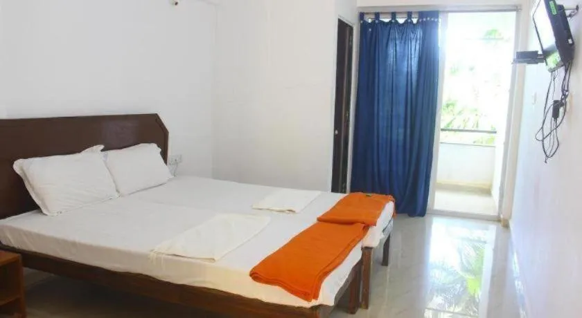 Bed in Poonam Village Resort