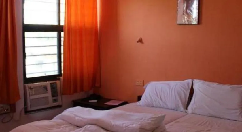 Bed in Poonam Village Resort