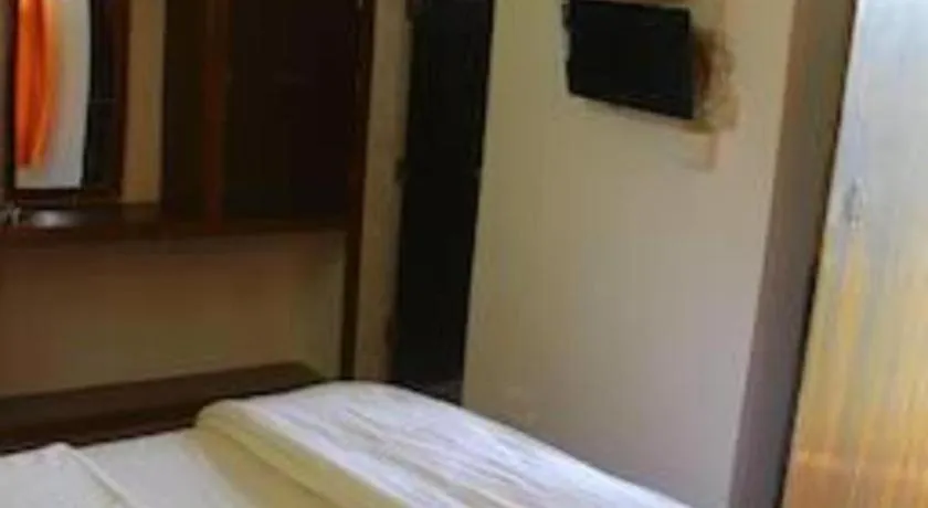 Bed in Poonam Village Resort