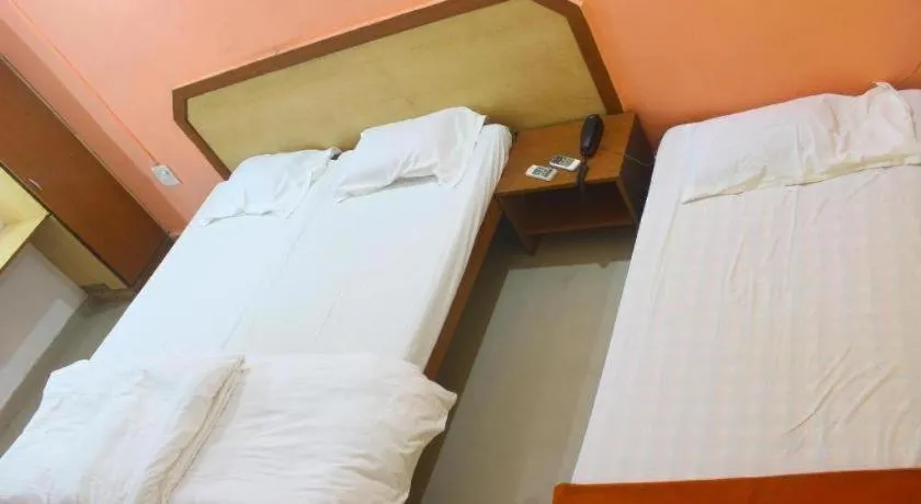 Bed in Poonam Village Resort