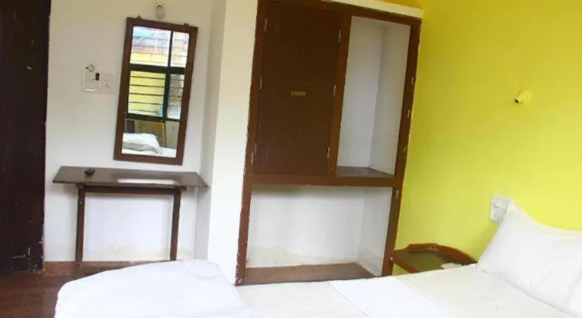 Bed in Poonam Village Resort