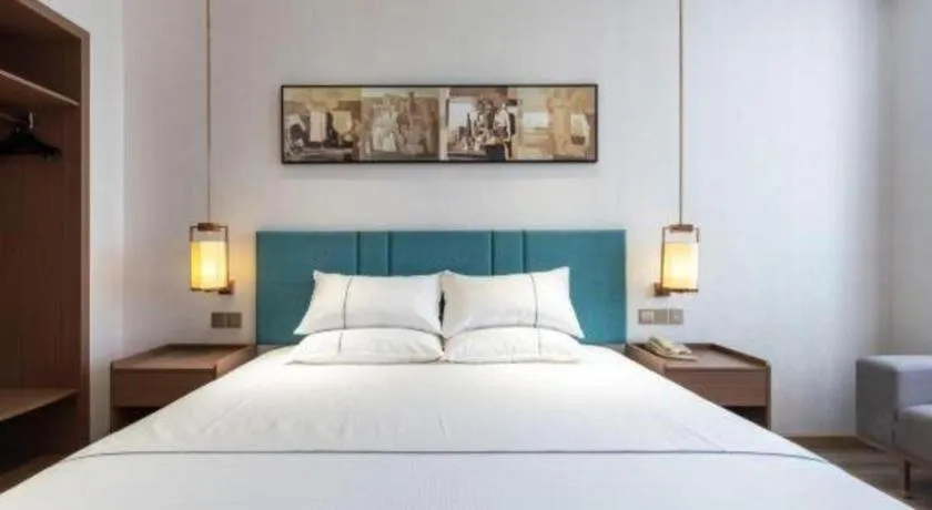 Bed in Jinjiang Inn Tianjin Konggang Branch