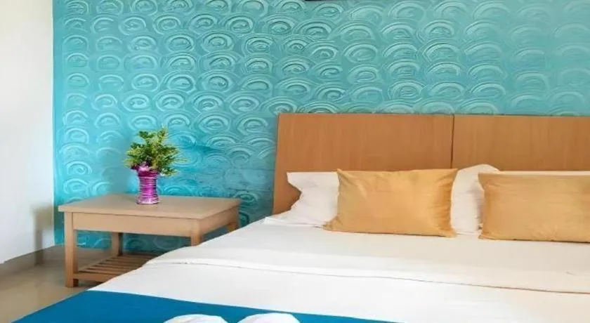 Bed in Palm Air by Goa Signature Stays