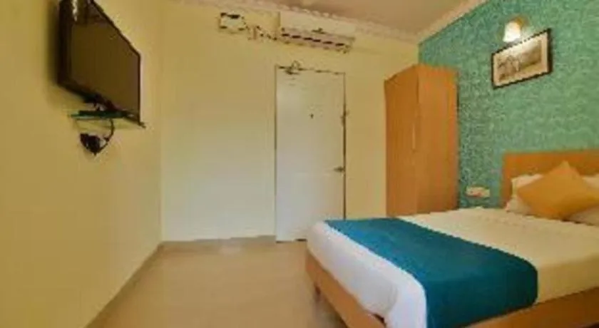 Bed in Palm Air by Goa Signature Stays