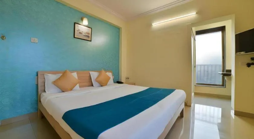 Bed in Palm Air by Goa Signature Stays