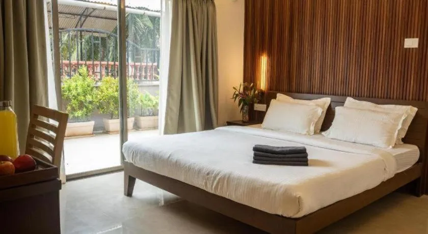 Bed in Palm Air by Goa Signature Stays