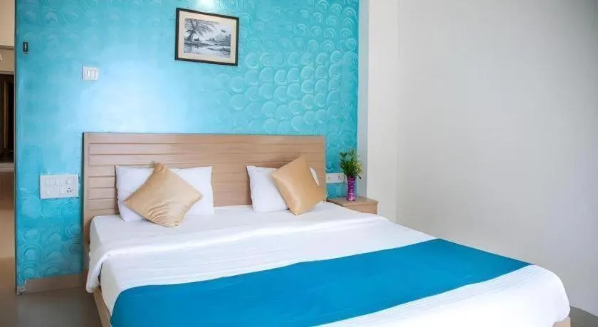 Bed in Palm Air by Goa Signature Stays