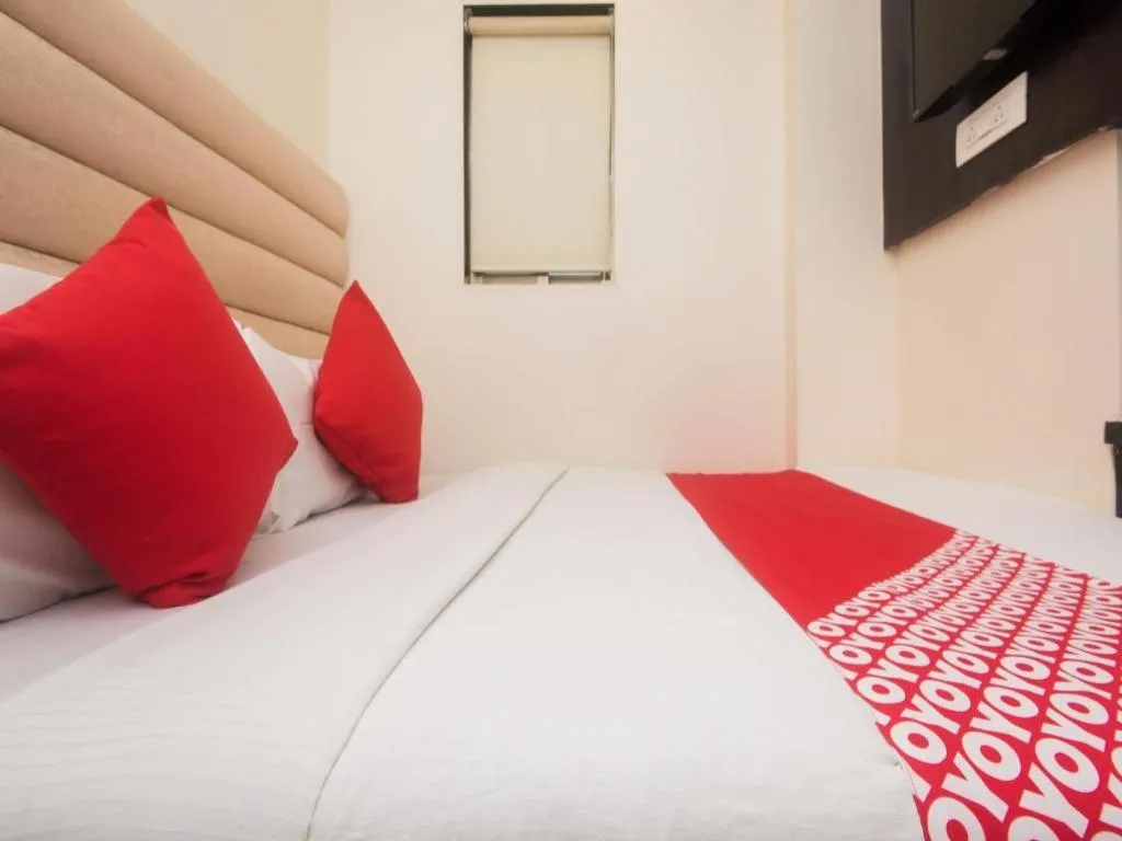 Bed in OYO 3782 Hotel Adnoc Inn