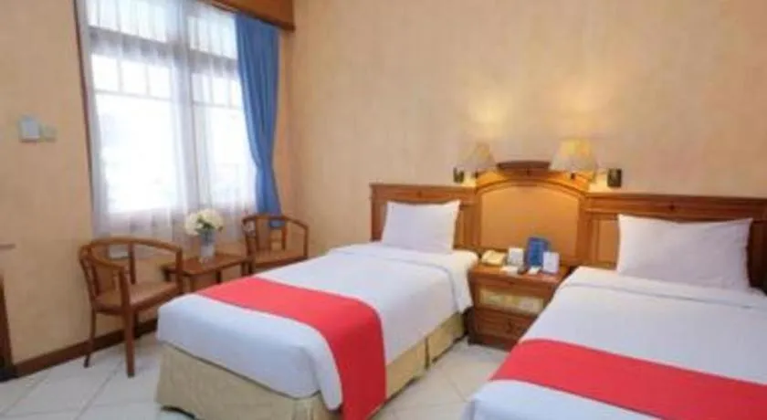 Bed in Diamond Hotel Solo