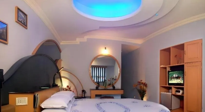 Bed in Hotel Hilltop Towers