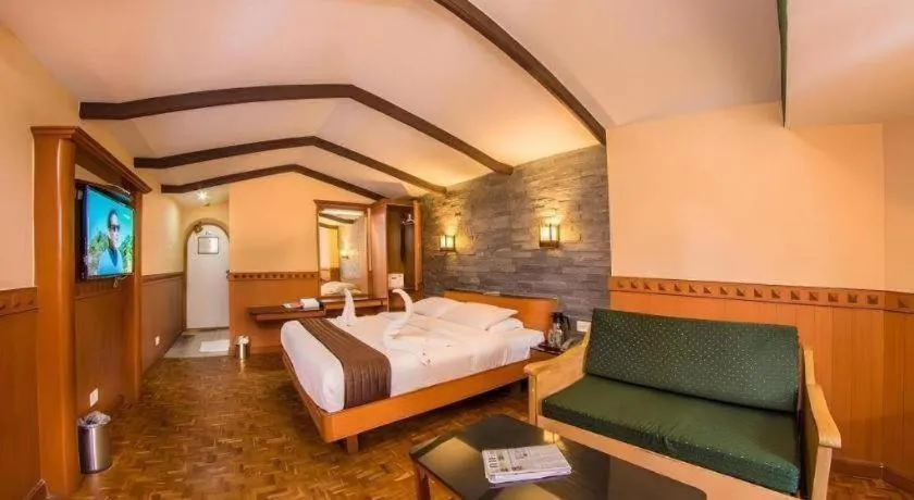 Bed in Hotel Hilltop Towers